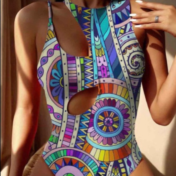 Anastasia’s Romance Other - NWT Gorgeous brightly colored graphics. One piece